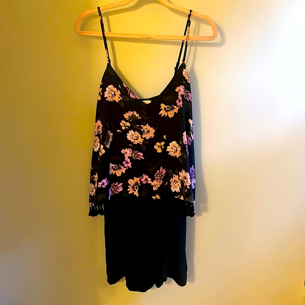 Printed jumpsuit with relaxed tank top and tassel trim. Size S.